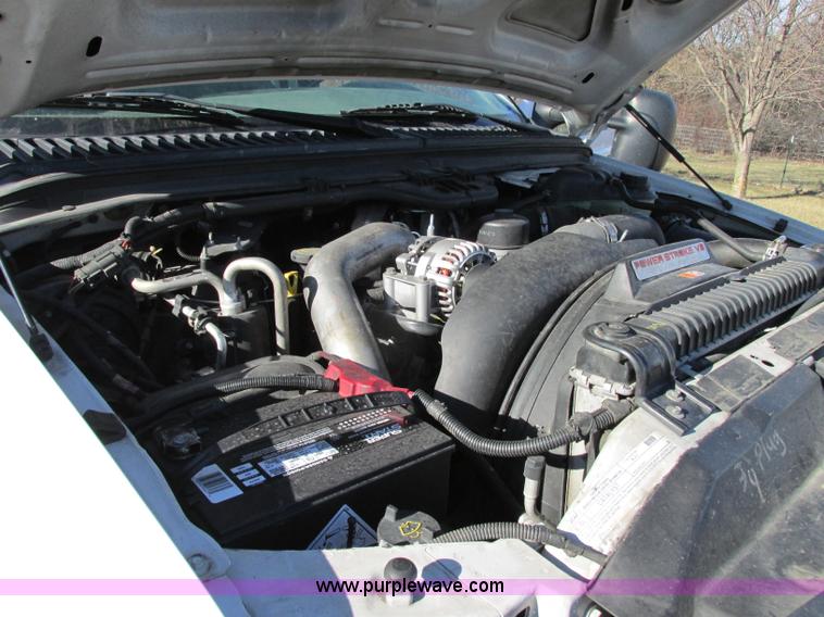 image for item F5480 2006 Ford F350 Super Duty XL SuperCab flatbed pickup truck