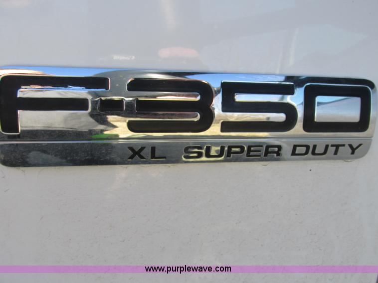 image for item F5480 2006 Ford F350 Super Duty XL SuperCab flatbed pickup truck