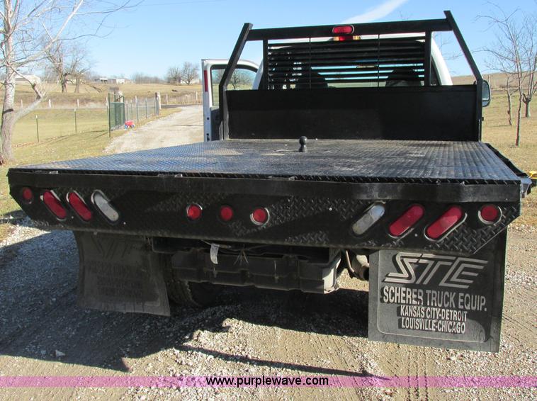 image for item F5480 2006 Ford F350 Super Duty XL SuperCab flatbed pickup truck