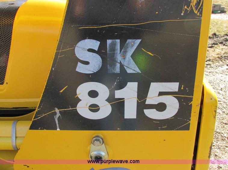 image for item F5481 2005 Komatsu SK815 skid steer