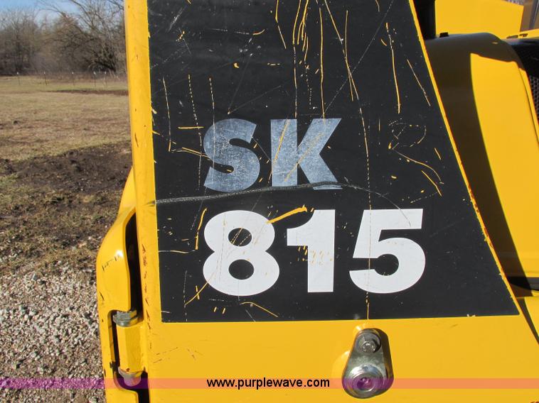 image for item F5481 2005 Komatsu SK815 skid steer