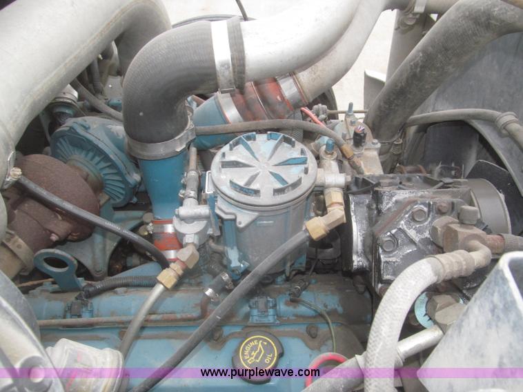 image for item F7218 1998 International 810 low profile dump truck