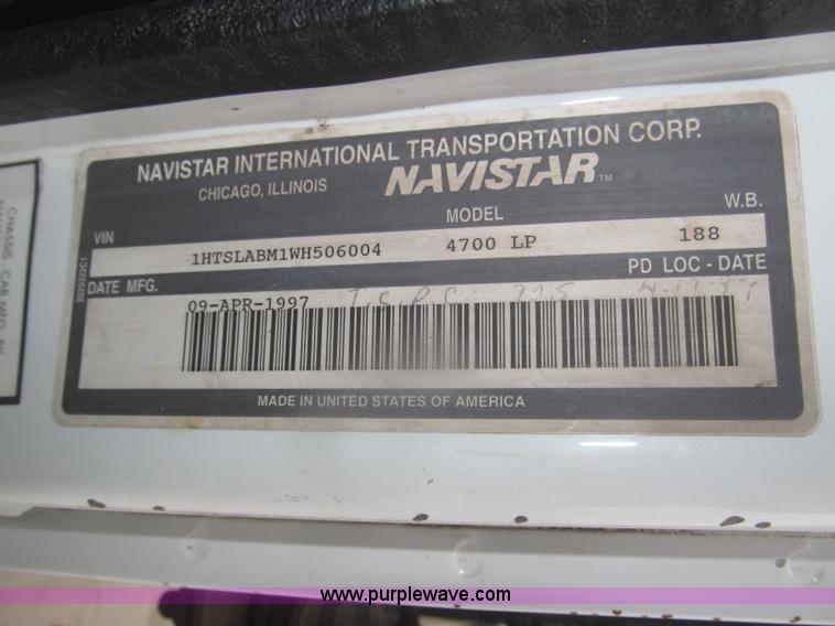 image for item F7218 1998 International 810 low profile dump truck