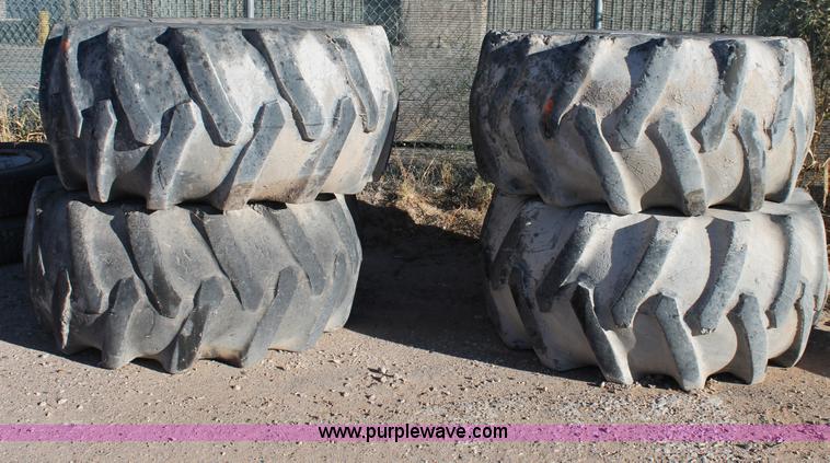 image for item G5833 (4) 28L-26 loader tires and wheels