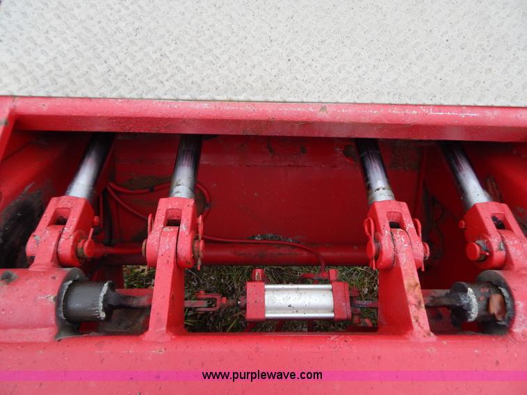 image for item H3920 1999 Talbert triple axle lowboy trailer with stinger