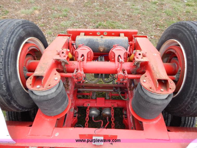 image for item H3920 1999 Talbert triple axle lowboy trailer with stinger