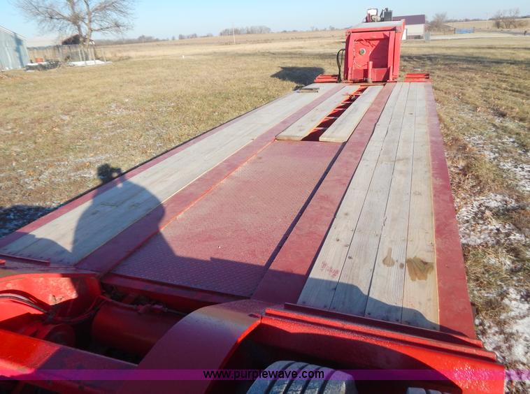 image for item H3920 1999 Talbert triple axle lowboy trailer with stinger