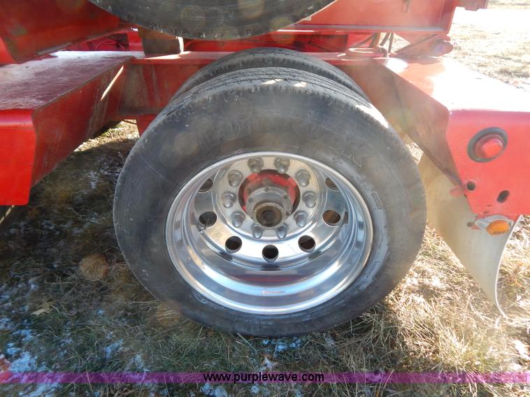 image for item H3920 1999 Talbert triple axle lowboy trailer with stinger