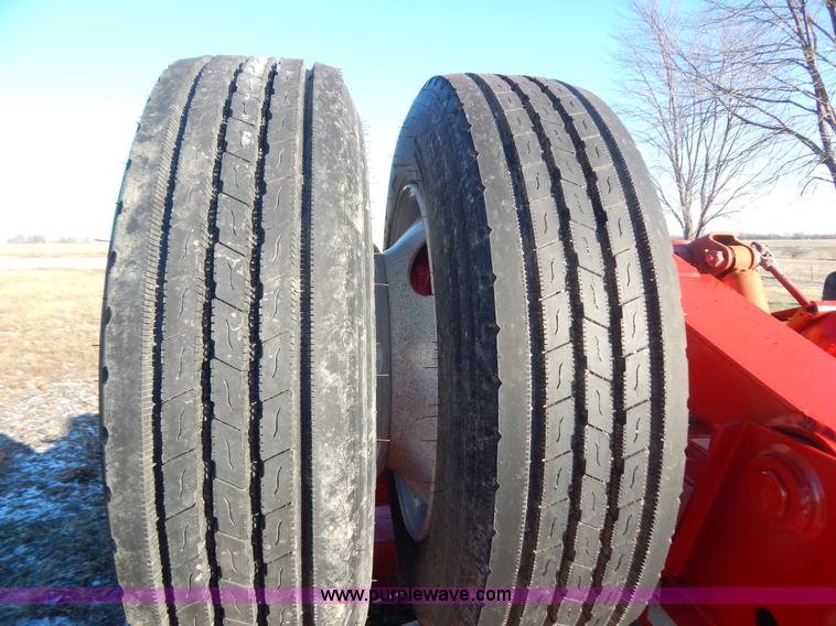 image for item H3920 1999 Talbert triple axle lowboy trailer with stinger