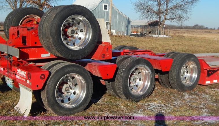 image for item H3920 1999 Talbert triple axle lowboy trailer with stinger