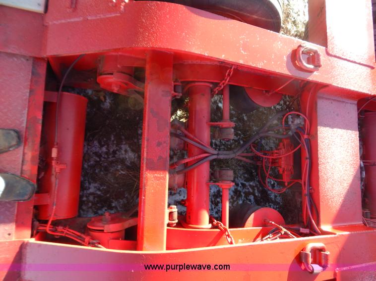 image for item H3920 1999 Talbert triple axle lowboy trailer with stinger