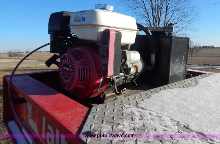 image for item H3920 1999 Talbert triple axle lowboy trailer with stinger