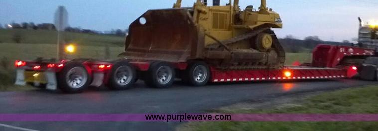 image for item H3920 1999 Talbert triple axle lowboy trailer with stinger