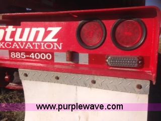 image for item H3920 1999 Talbert triple axle lowboy trailer with stinger