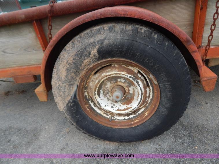 image for item H3949 1990 single axle tilt deck trailer