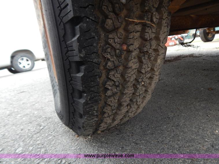 image for item H3949 1990 single axle tilt deck trailer