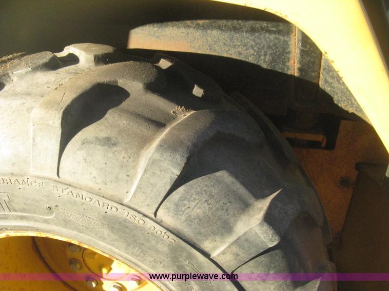 image for item H4252 1996 John Deere 310D backhoe