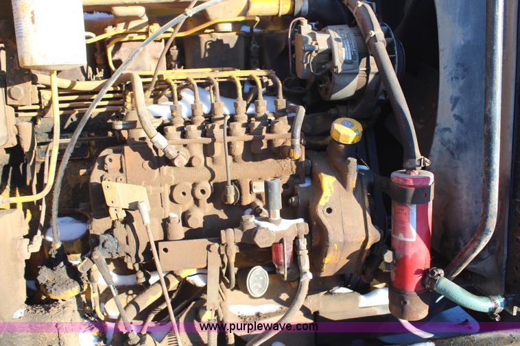 image for item H7856 1978 John Deere 762 scraper