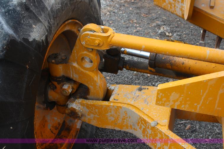 image for item H7933 1988 Champion 710A articulated motor grader