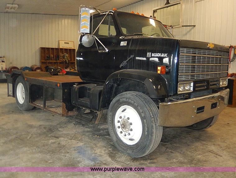image for item I9491 1986 Chevrolet Kodiak flatbed truck