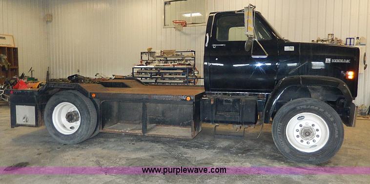 image for item I9491 1986 Chevrolet Kodiak flatbed truck