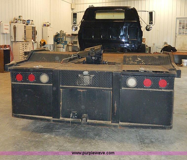 image for item I9491 1986 Chevrolet Kodiak flatbed truck