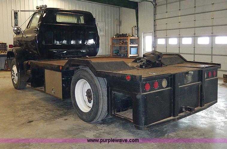 image for item I9491 1986 Chevrolet Kodiak flatbed truck