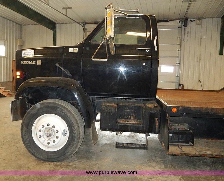 image for item I9491 1986 Chevrolet Kodiak flatbed truck