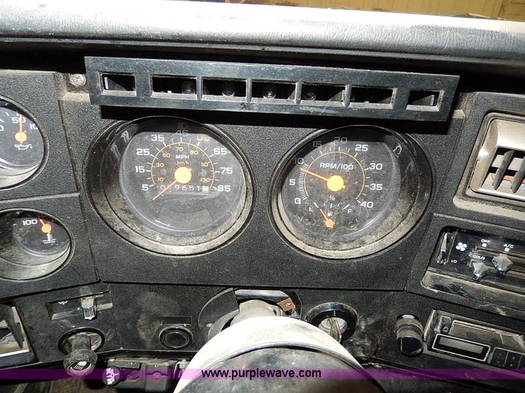 image for item I9491 1986 Chevrolet Kodiak flatbed truck