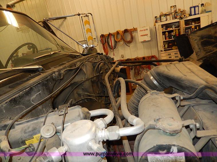 image for item I9491 1986 Chevrolet Kodiak flatbed truck