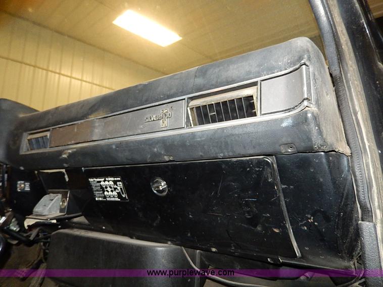 image for item I9491 1986 Chevrolet Kodiak flatbed truck