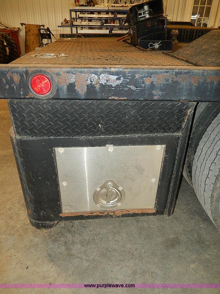 image for item I9491 1986 Chevrolet Kodiak flatbed truck