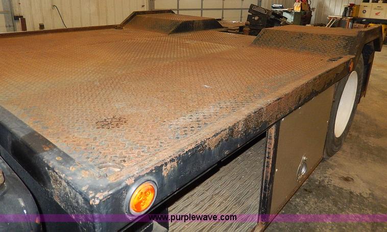 image for item I9491 1986 Chevrolet Kodiak flatbed truck