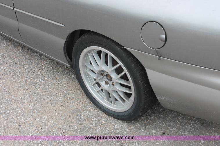 image for item H8332 1998 Chrysler Sebring JX convertible