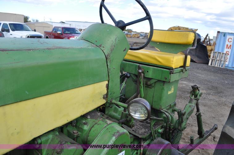 image for item G6195 1960 John Deere 730 tractor