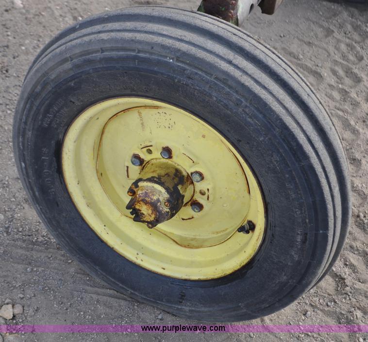 image for item G6195 1960 John Deere 730 tractor