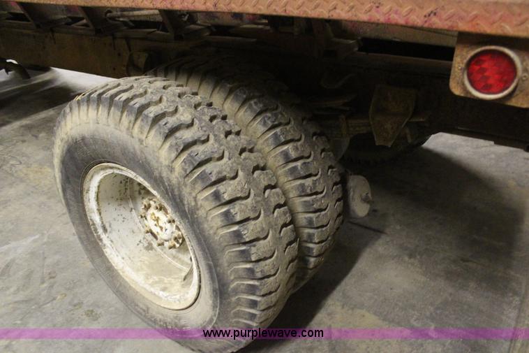 image for item H7805 1979 GMC 7000 spreader truck