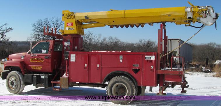 image for item G2216 1997 GMC C7500 digger derrick truck