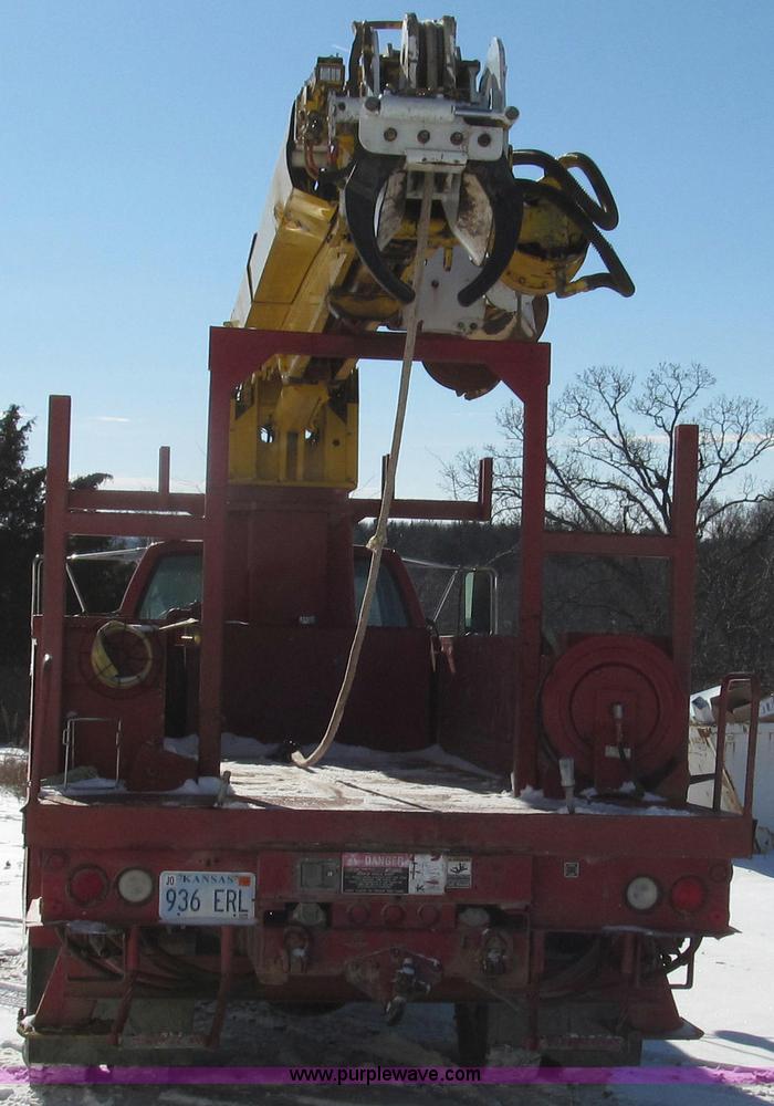 image for item G2216 1997 GMC C7500 digger derrick truck