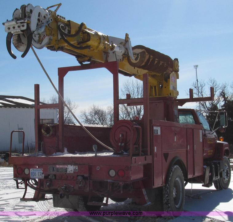 image for item G2216 1997 GMC C7500 digger derrick truck