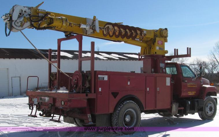 image for item G2216 1997 GMC C7500 digger derrick truck