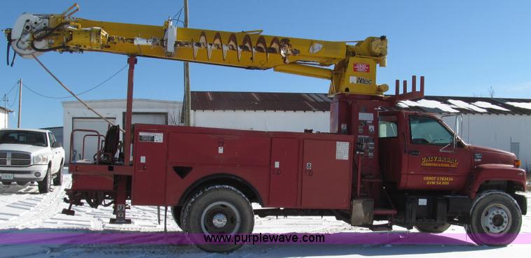 image for item G2216 1997 GMC C7500 digger derrick truck