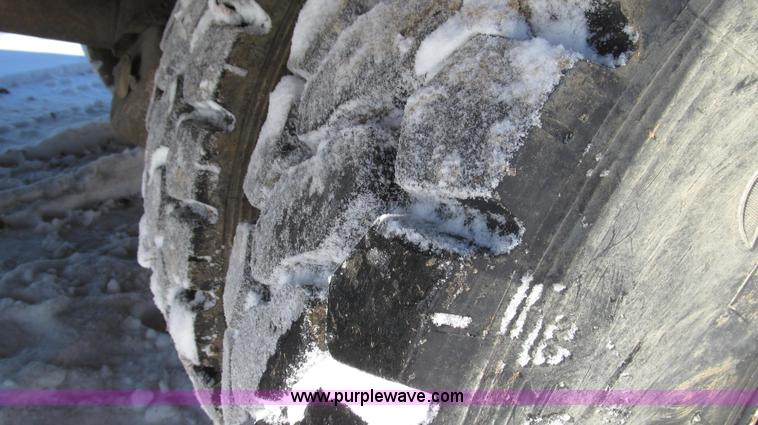 image for item G2216 1997 GMC C7500 digger derrick truck