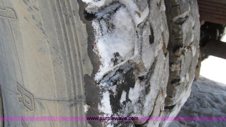 image for item G2216 1997 GMC C7500 digger derrick truck