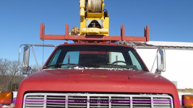 image for item G2216 1997 GMC C7500 digger derrick truck