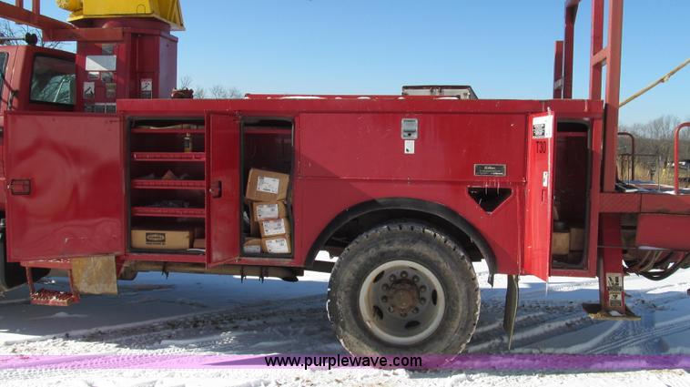 image for item G2216 1997 GMC C7500 digger derrick truck