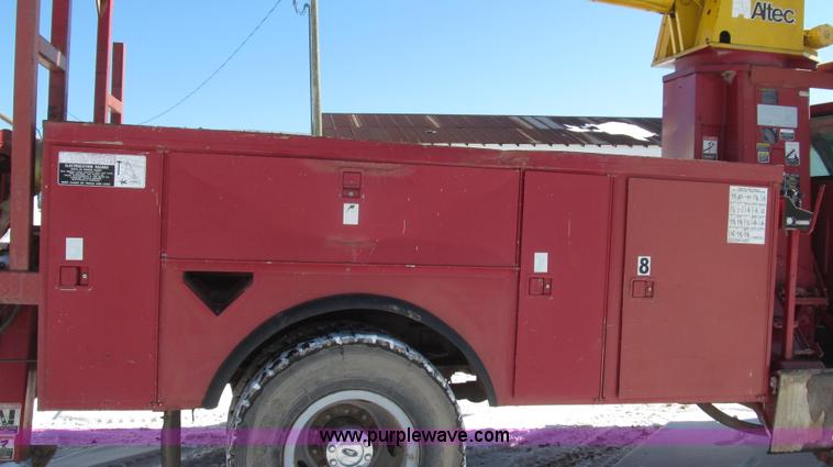 image for item G2216 1997 GMC C7500 digger derrick truck