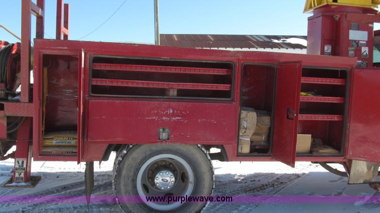 image for item G2216 1997 GMC C7500 digger derrick truck