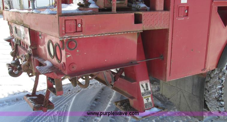 image for item G2216 1997 GMC C7500 digger derrick truck