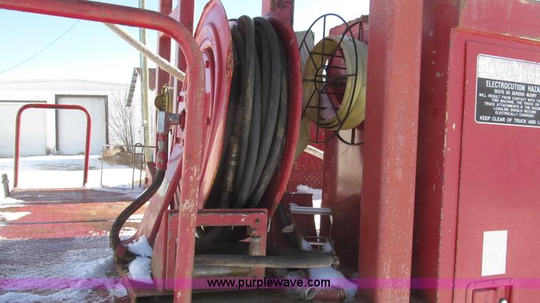 image for item G2216 1997 GMC C7500 digger derrick truck